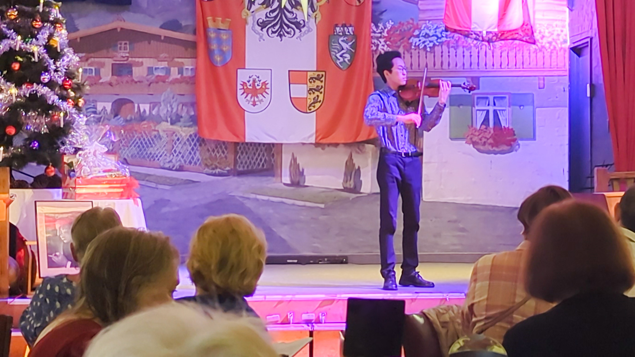 Daniel Feng, violinist, playing at a corporate event